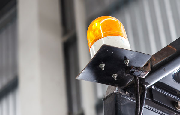 Top-Mounted flashing warning light commonly used on Toyota forklift trucks to communicate to other people that the lift truck is operating.
